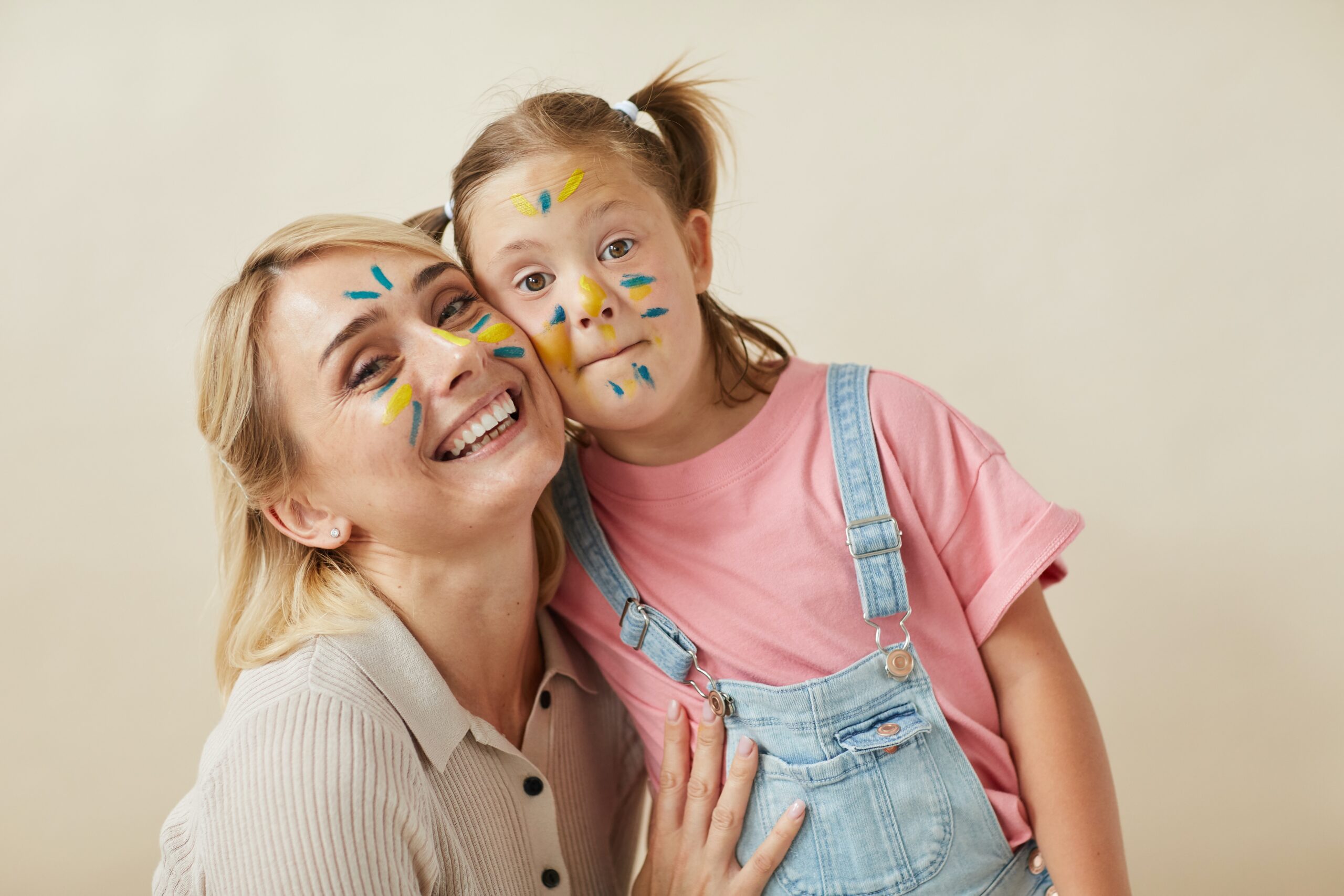 Happy family with painted faces